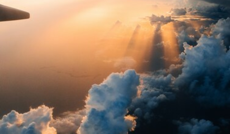 Sunset seen from airplane during flight